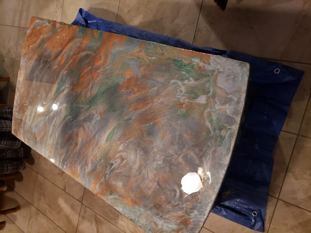 Custom metallic epoxy coffee table with emerald, copper and silver mixed